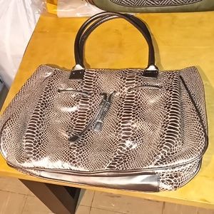 Reb'l Fluer by Rihanna silver snakeskin bag